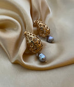 handcrafted gold filigree statement earrings with organic-shaped grey pearls
