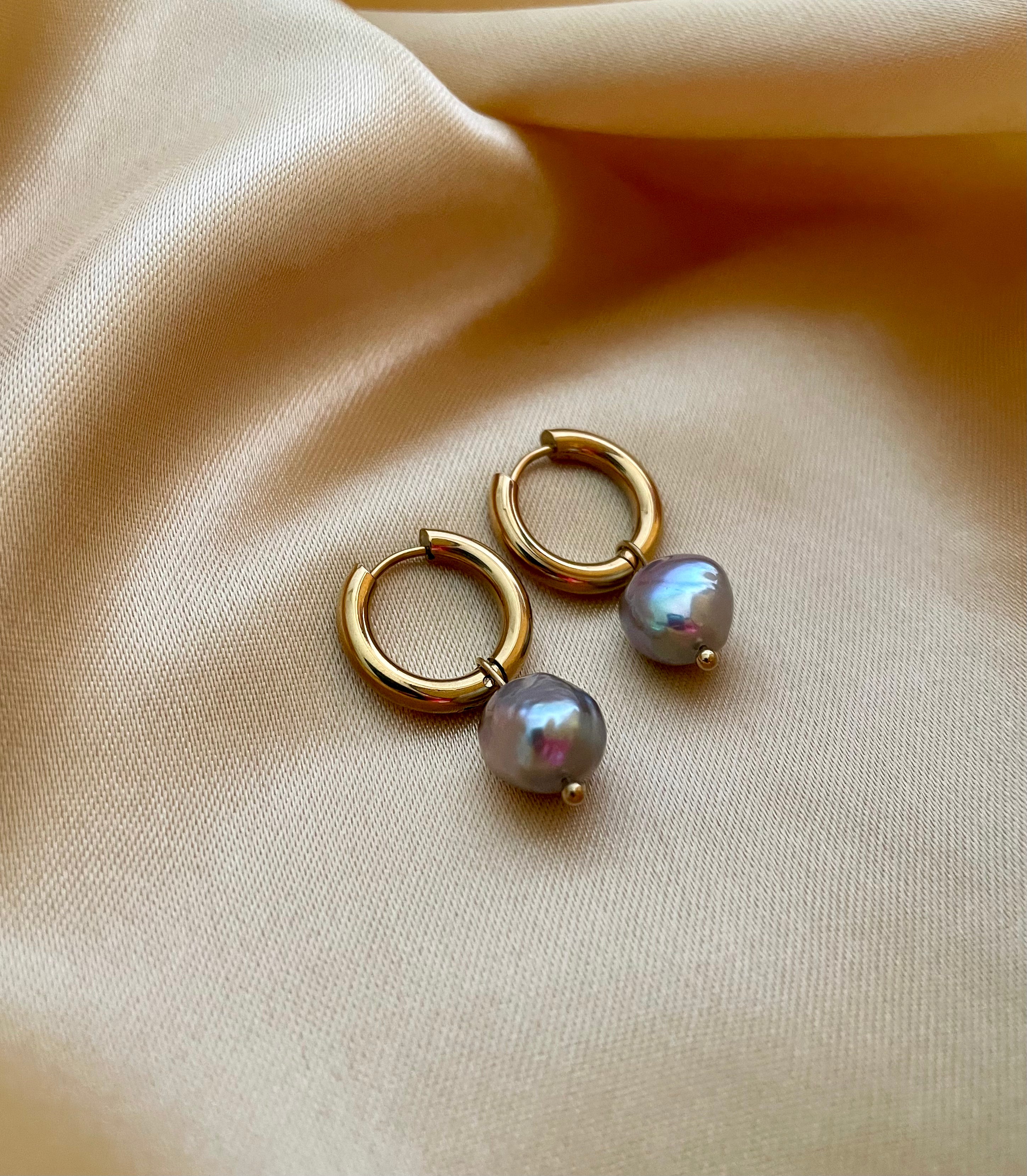 small gold hoop earrings with a metallic grey baroque pearl drop
